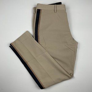 Tan pants with side stripes
